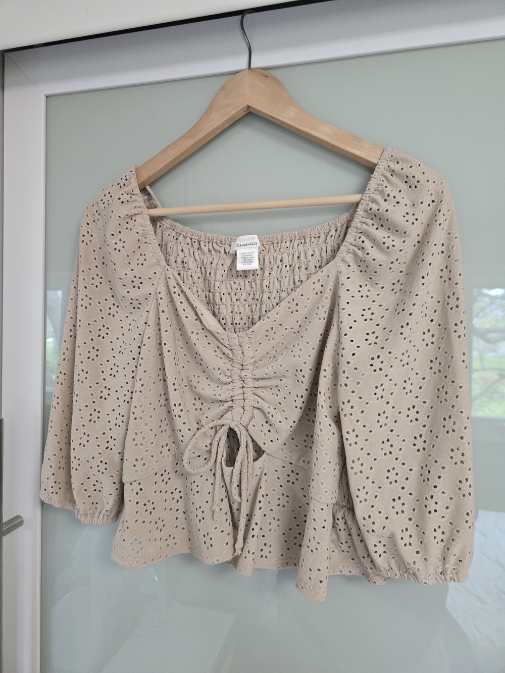 Eyelet Drawstring Peplum Top in Beige